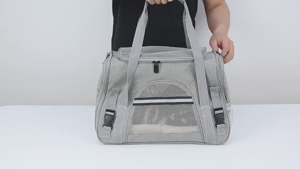 Portable and breathable carrier for cats and dgs weighing up to 10 kilograms. Opens from 3 sides as well as from above.